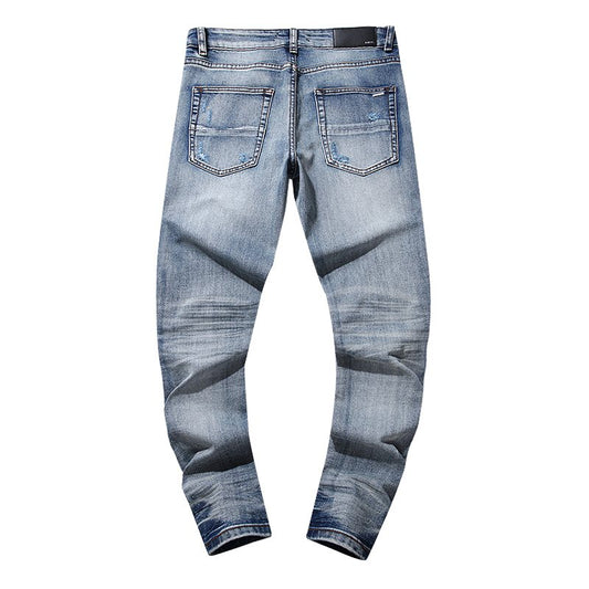 Amiri Light Blue Distressed Denim Jeans — back